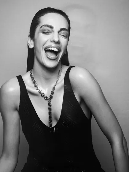 Another candid, laughing shot in black and white. It shows that a great skin-focused makeup look is beautiful in any light.