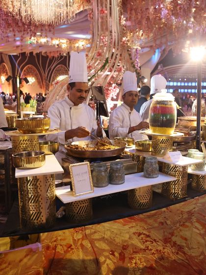 Our chefs at a live chaat counter, assembling delicious and tangy street food classics with fresh ingredients and authentic spices.