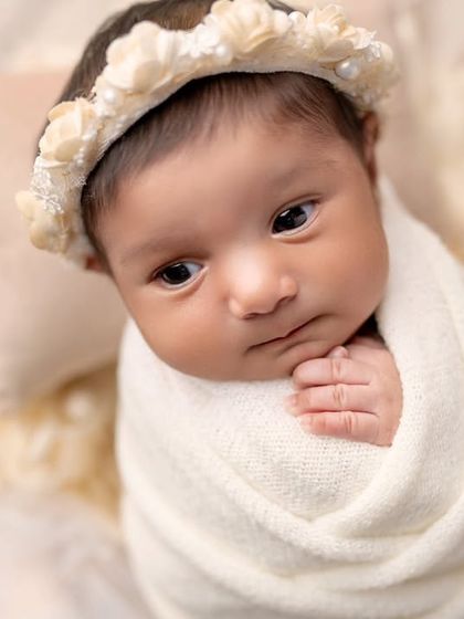 Those curious, brand-new eyes. Capturing a quiet, awake moment during a newborn session is just as precious as the sleepy ones.