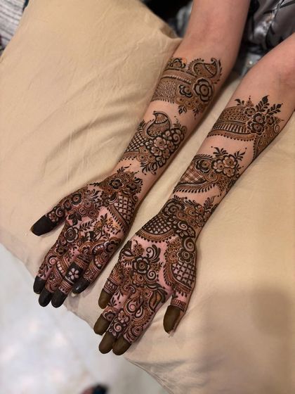 This image shows the design against a neutral background, allowing you to focus on the details of the peacocks and floral bands.