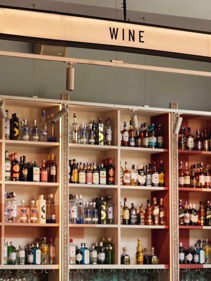 Our "WINE" selection is carefully curated to complement our menu. We offer a diverse range of bottles from around the world, all available to explore by the glass.