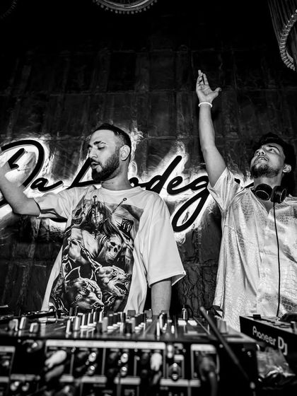 A black and white shot of me and D'ARK at Da Bodega, where the vibe is always on point.