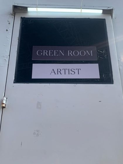 The "Artist" sign on my green room door for Anuv Jain's show. A small sign representing a huge dream realized.