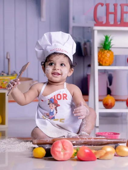 Baking up smiles with our little master chef. Our themed photoshoots are filled with fun props and endless giggles, creating memories that are as sweet as they are unique.