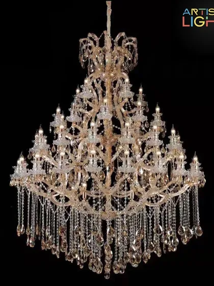 The Maria Theresa style is the gold standard for classic elegance. This chandelier features ornate arms, countless crystals, and a traditional form that has defined luxury for centuries, perfect for heritage properties.