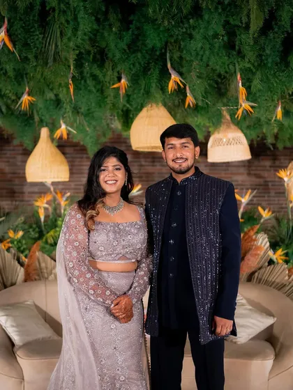 A candid moment of laughter between Yeshaswini and Shashank. We designed a boho-chic backdrop with cane lanterns and birds of paradise that perfectly matched their relaxed and happy vibe.