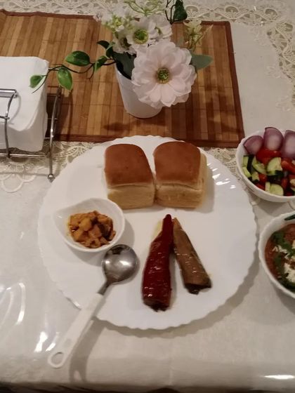 This is how we love to eat. A full plate with a little bit of everything, and of course, a generous serving of mom's desi pickle.