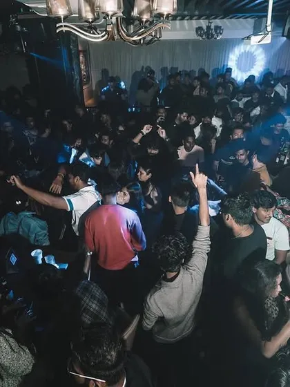 Look at that packed floor. My goal is simple: keep the club full and the bodies moving from the first track to the last. This is the view from my console on a massive Saturday night.