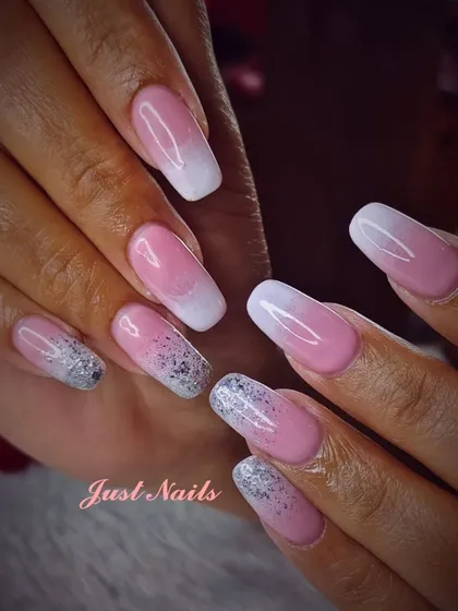 A lovely pink and white ombre design with two silver glitter accent nails.