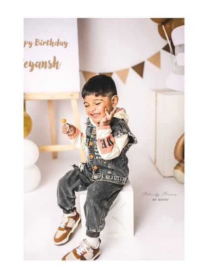 A sweet smile and a lollipop make this third birthday portrait extra special. It's the little moments of joy I love to capture.