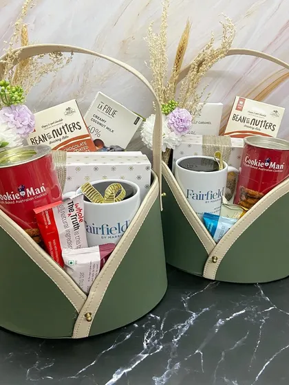 A pair of the Fairfield by Marriott welcome baskets, showing how I can execute beautiful and consistent corporate orders.