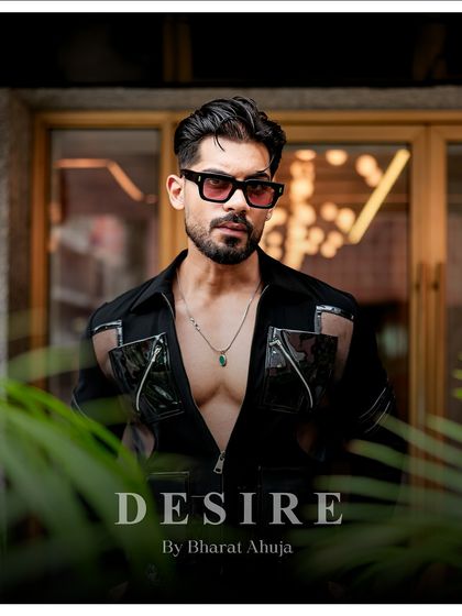 A powerful portrait in the black utility shirt. This is for the man who owns his presence and wears confidence like a second skin.