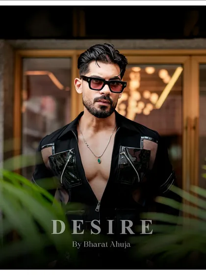 A powerful portrait in the black utility shirt. This is for the man who owns his presence and wears confidence like a second skin.