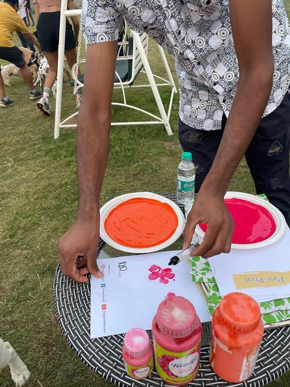A close-up of our paw-print painting activity. It's a fun, safe way to create a unique keepsake to remember your special day at the park.