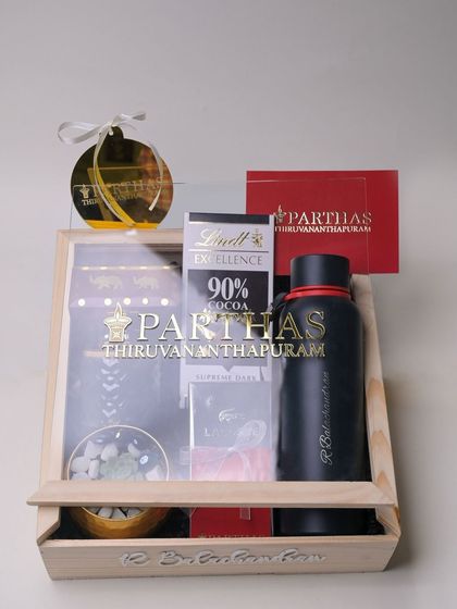 The corporate gift box with its acrylic lid, which is also branded with the Parthas logo, ensuring a premium unboxing experience from start to finish.