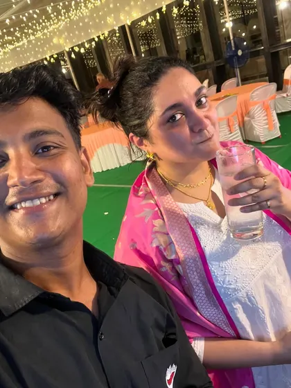 Sharing a moment with a guest at a Diwali party. We strive to create a personal connection with everyone we serve.