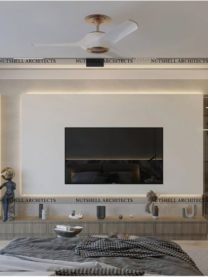 The TV unit in this bedroom is simple yet elegant, with a floating console and a discreetly fluted side panel. The design prioritizes a clean, uncluttered look to maintain the room's serene atmosphere.