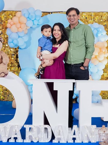 A vibrant 'Pokemon' themed birthday party, with character cutouts, a custom backdrop of the Kanto region, and red and white balloons, ready for a Pokemon battle.