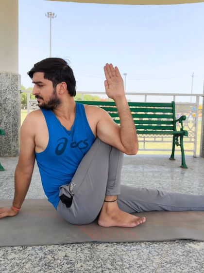 This is Marichyasana C, a seated spinal twist. I use this asana to improve the flexibility of the spine and neck, while also stimulating the abdominal organs.