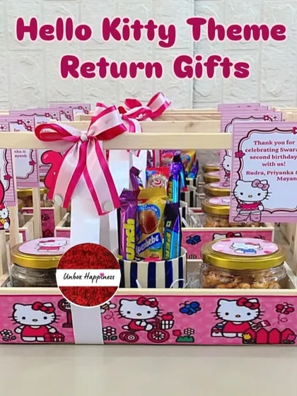Say "Hello Kitty" to these adorable second birthday return gifts. The baskets are decorated in a pink Hello Kitty theme and filled with jars of treats and a cup of assorted candies and stationery.