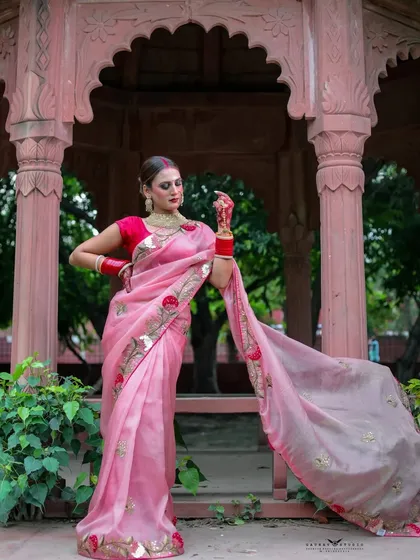 A similar full-length shot, capturing a different pose that showcases the saree's elegance.
