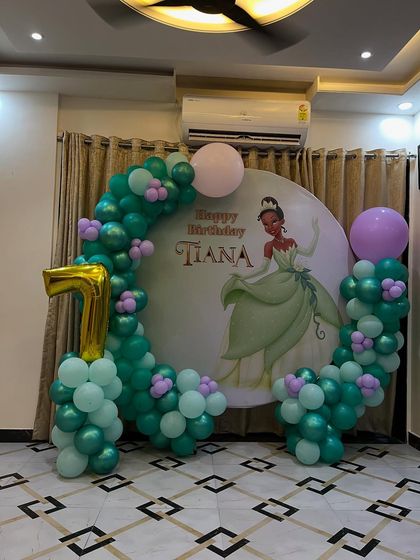 The full view of the Princess Tiana birthday decoration, showing how all the elements come together in a home setting.