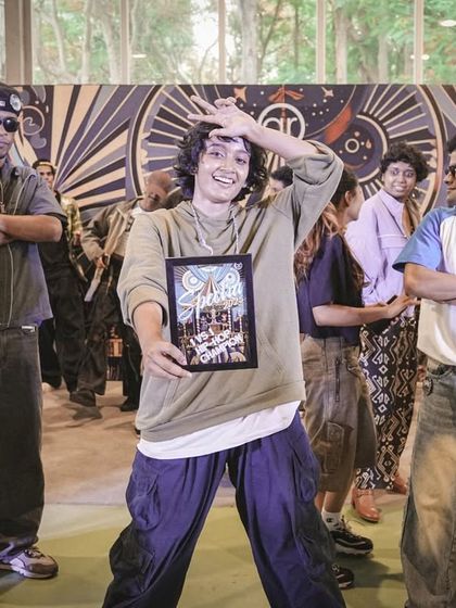 The winner of the 1v1 Hip-Hop battle, Tishara, celebrating her victory after leaving it all on the dance floor.