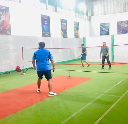 A doubles game with everyone in position, anticipating the next move from the opponent.