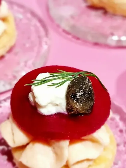 A close-up of a beetroot and goat cheese canapé from the Benefit Cosmetics "Pink Lady Power" themed event. We use fresh ingredients to create colorful, brand-aligned bites.