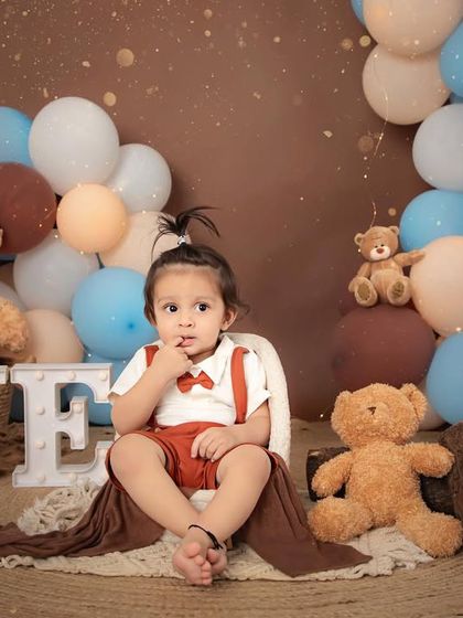 A pensive moment with his teddy bear friends. Even the quiet moments during a first birthday shoot are precious and worth capturing.
