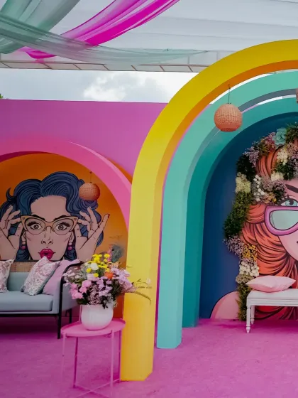A 'Mehendi Fiesta in Technicolor' is all about playful energy. I used bold pop-art prints and a kaleidoscope of vibrant colors to create a retro-glam atmosphere inspired by the artsy vibes of Coachella.