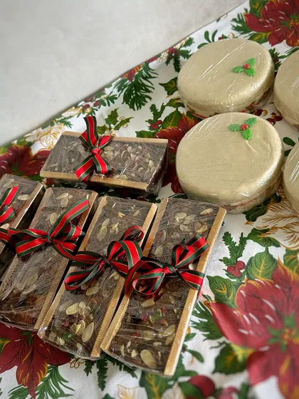 Here is my signature Christmas rum plum cake, ready for its journey! I pack these dense, fruit-filled cakes securely so they can be shipped worldwide to bring a taste of home to your loved ones.