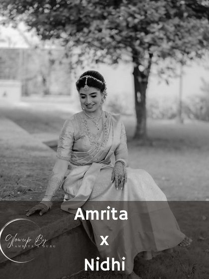 A beautiful black and white shot of Nidhi, capturing a quiet moment on her wedding day.