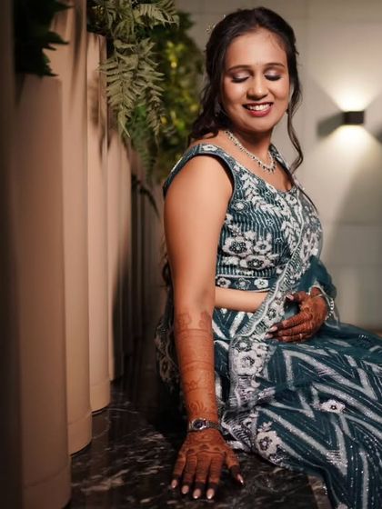 A beautiful portrait of the bride-to-be, with her partner in the background, creating a sense of depth and story.