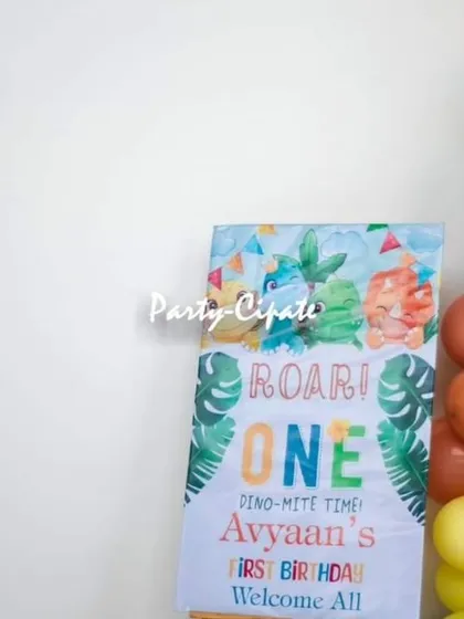 The personalized 'Roar! One' welcome sign for Avyaan's dino-mite first birthday party.