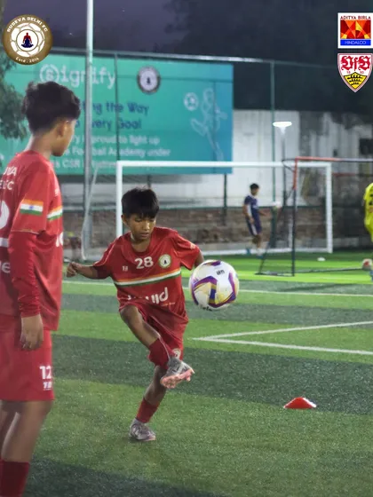 A young Sudevan in our red kit focuses on his first touch. Every training session is an opportunity to get better and move closer to the dream.