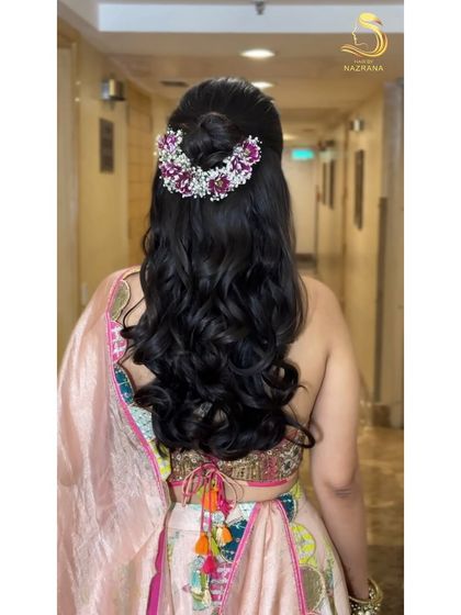 Another angle of the beautiful floral half-updo.