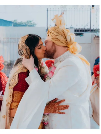 The first kiss as a married couple. This is a pinnacle moment of romance and commitment, and we capture it with a focus on genuine emotion, preserving the intimacy of this unforgettable promise.