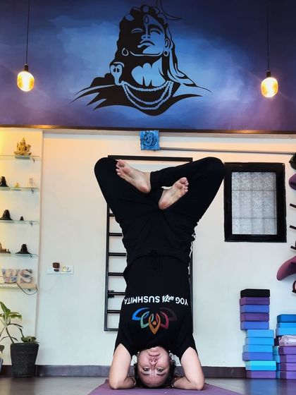 A headstand variation in the studio. Going upside down is always fun and brings a rush of energy and clarity.