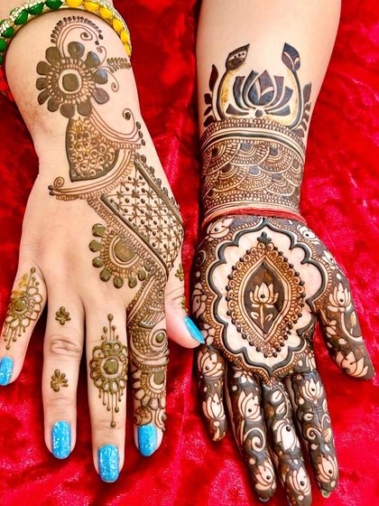 A great example of mixing styles. One hand features a modern Arabic floral vine, while the other has a traditional lotus mandala, showing how you can have the best of both worlds.