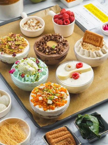 I believe in creative desserts that blend tradition with modern flair. Our Fusion Globe Cakes are a perfect example, featuring unique combinations like Paan Rasmalai, Thandai Cheesecake, and Parle-G Tres Leches, all handcrafted and beautifully presented.