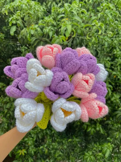 A mixed bouquet of purple, pink, and white velvet tulips.