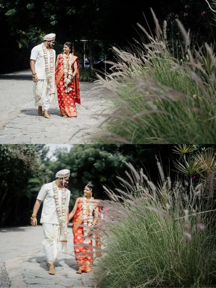 A couple walks hand-in-hand along a path at our venue. The tall wild grass adds a rustic and natural texture to this beautiful wedding portrait.