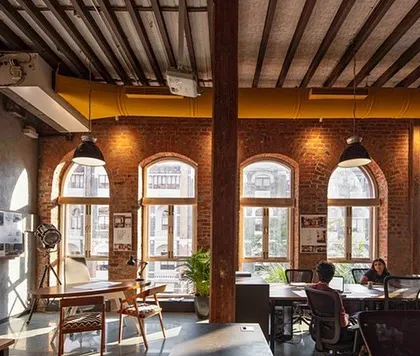 Our own studio, The Loft, is a testament to our love for adaptive reuse. We transformed a space within a 100-year-old Victorian building in South Bombay, exposing the original brick arches and wooden beams to create a workspace that is open, inspiring, and bathed in natural light.