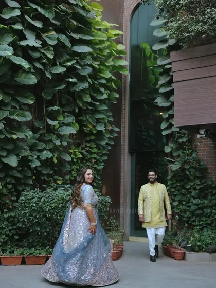 Another dynamic shot from the same series, capturing a glance back from the bride as her groom approaches.