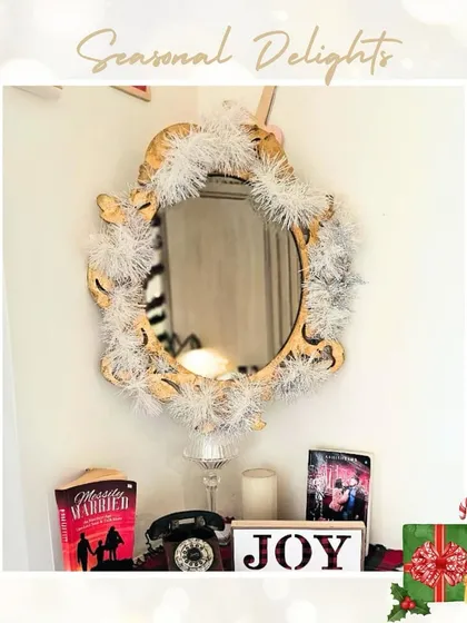Even our mirrors get a touch of seasonal delight. This vintage mirror is decorated with a white feather boa, adding a touch of festive glamour to the space.