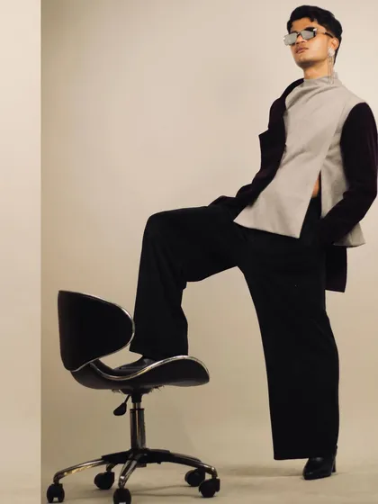A powerful shot from a gender-fluid power dressing concept. The studio provides a blank canvas for conceptual and avant-garde fashion shoots.
