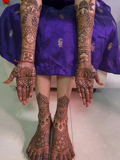 A combined view of the bride's hands and feet, showcasing the coordinated and intricate designs.