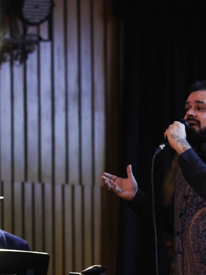 Sufi singer Dhruv Sangari performs a heartfelt rendition of an Aznavour song. Our tribute events feature diverse artists who bring their unique interpretations to classic works.