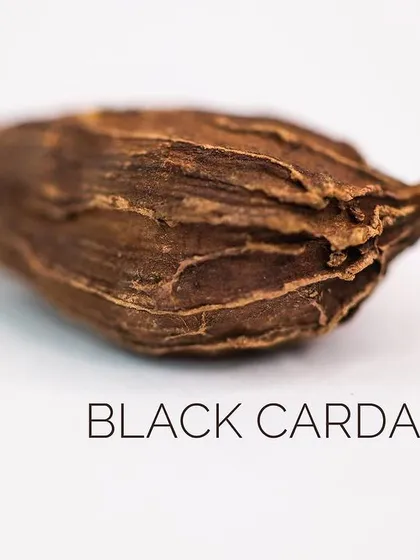 Black Cardamom, with its smoky and camphor-like aroma, provides a bold, intense flavor to savory North Indian curries.